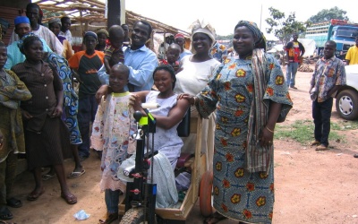 Woman travels from Nigeria to say thanks for mobility cart
