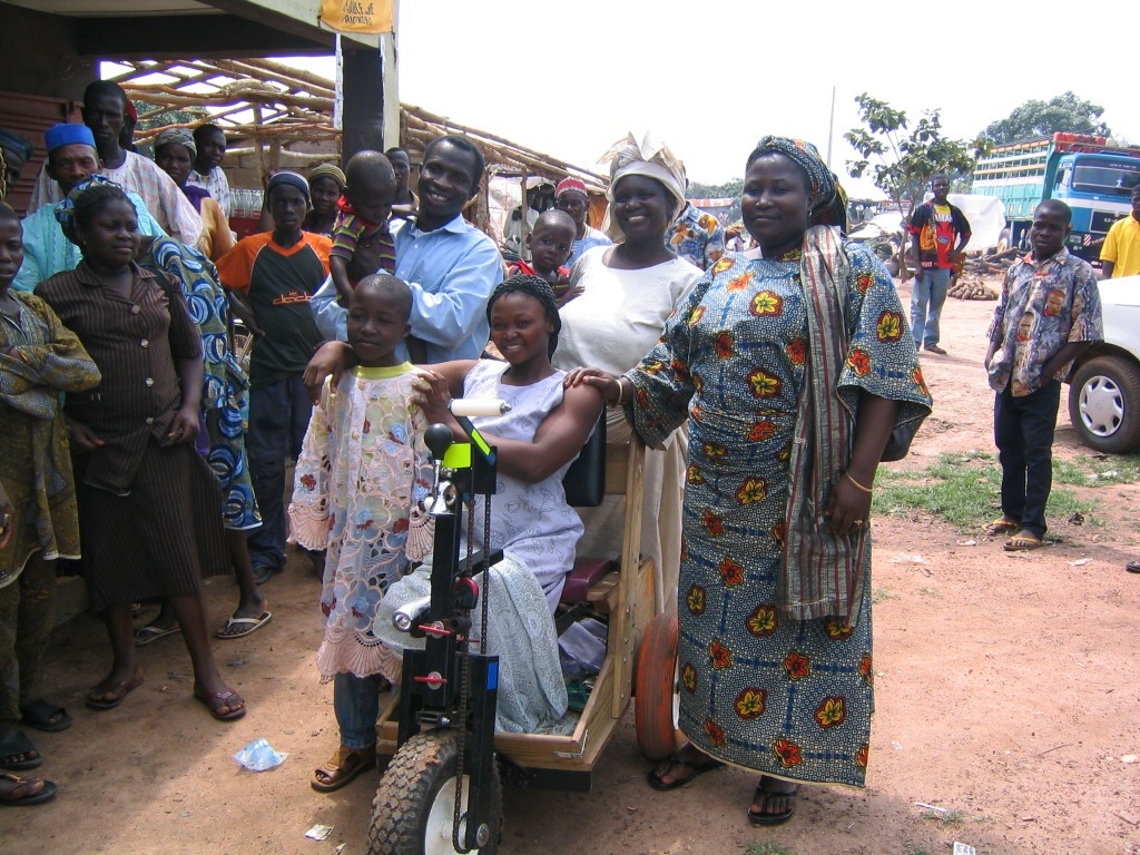 Woman travels from Nigeria to say thanks for mobility cart